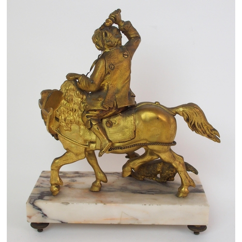 224 - A Continental gilt bronze figure of a boy on horseback