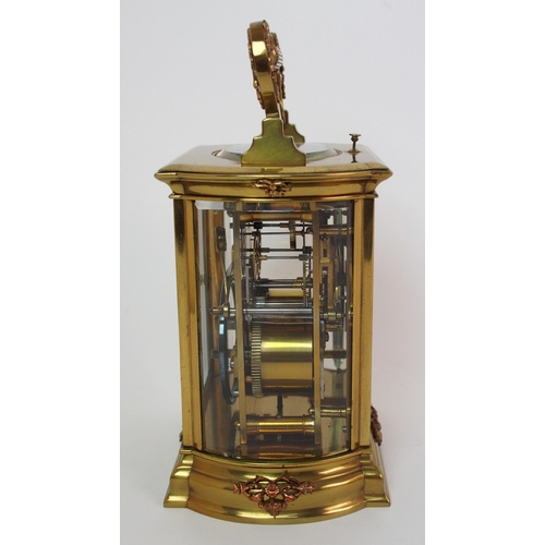 228 - A brass and glass repeater carriage clock