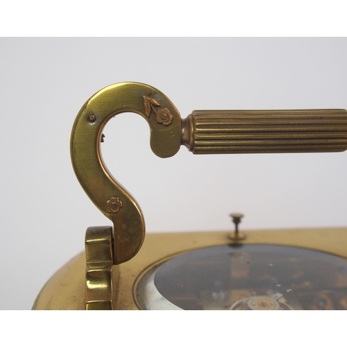 228 - A brass and glass repeater carriage clock