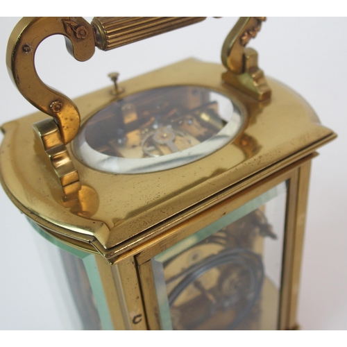 228 - A brass and glass repeater carriage clock