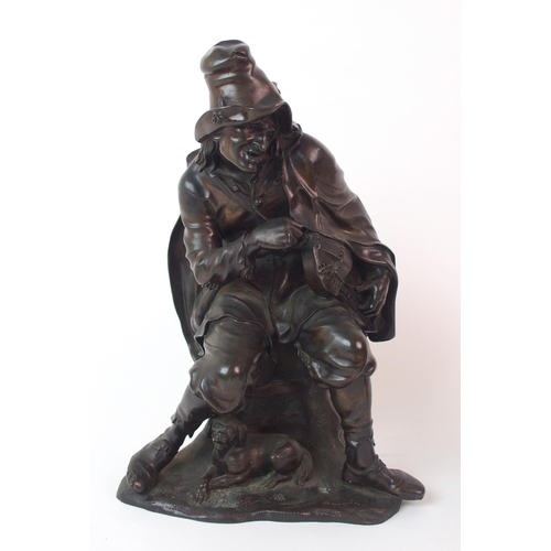 235 - A pair of patinated cast bronze figures