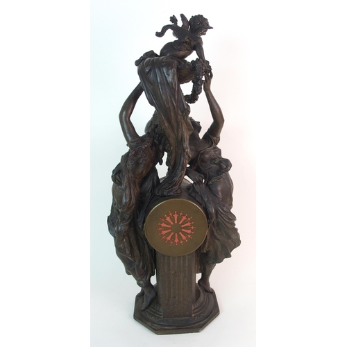 236 - A French patinated spelter  gilt bronze and onyx figural clock