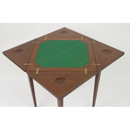 306 - An Edwardian mahogany and crossbanded envelope card table