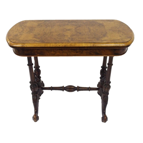 307 - A Victorian walnut card table