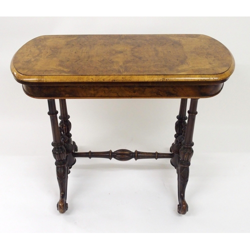 307 - A Victorian walnut card table