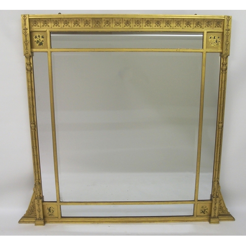 320 - A Victorian gilt and painted wood overmantle mirror