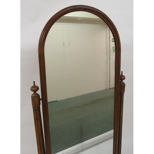 323 - A Victorian walnut cheval mirror