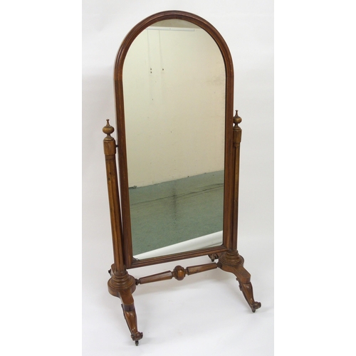 323 - A Victorian walnut cheval mirror