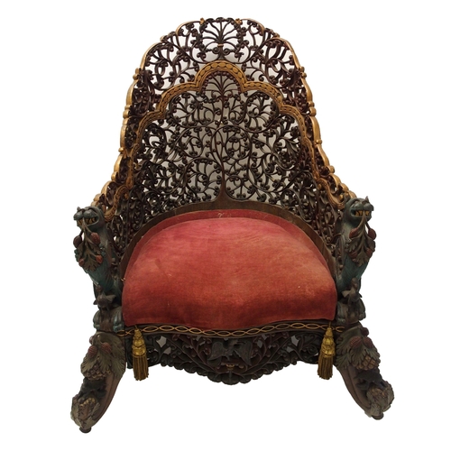 325 - An Anglo Indian carved  pierced and gilt armchair