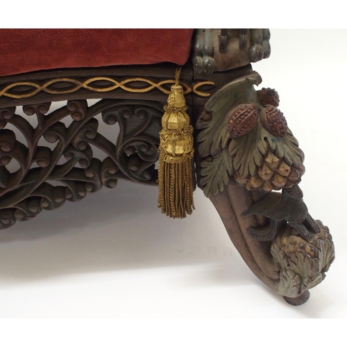 325 - An Anglo Indian carved  pierced and gilt armchair