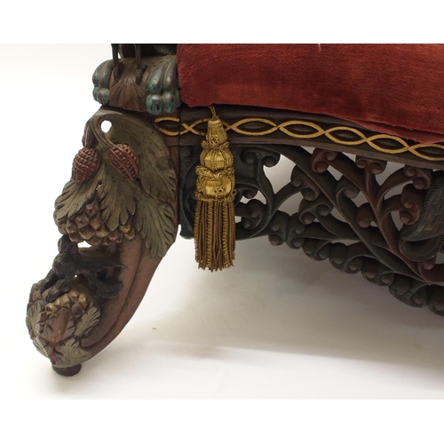 325 - An Anglo Indian carved  pierced and gilt armchair