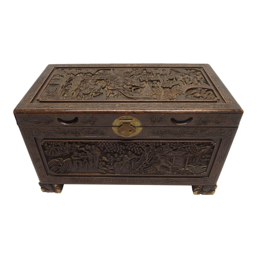 329 - A Chinese camphorwood carved blanket chest