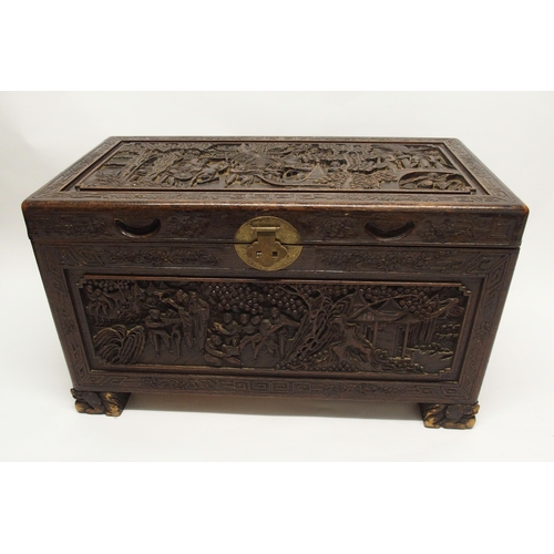 329 - A Chinese camphorwood carved blanket chest