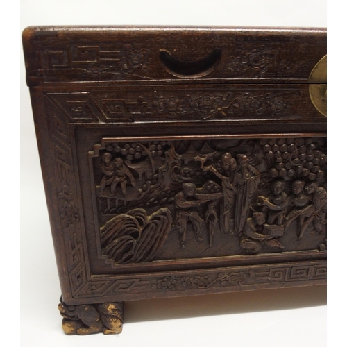 329 - A Chinese camphorwood carved blanket chest