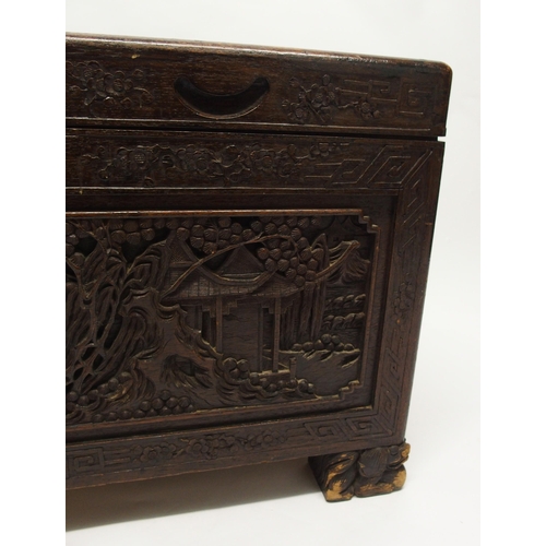 329 - A Chinese camphorwood carved blanket chest