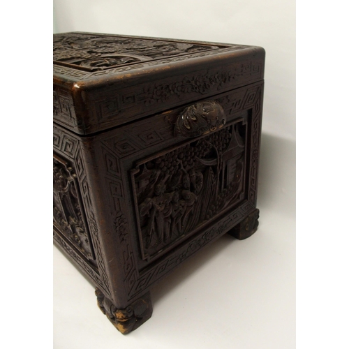 329 - A Chinese camphorwood carved blanket chest