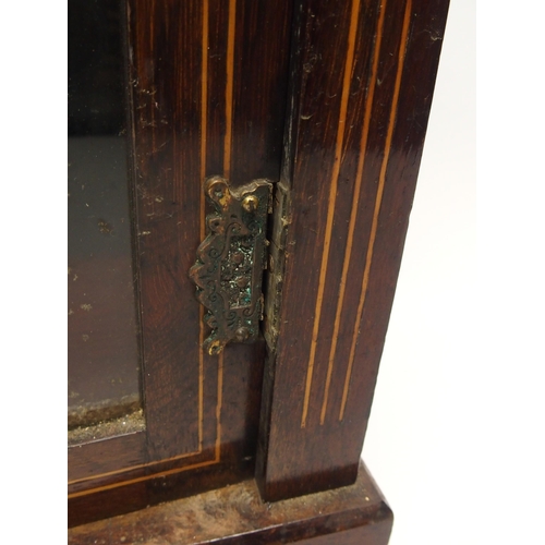 330 - A Victorian rosewood music cabinet