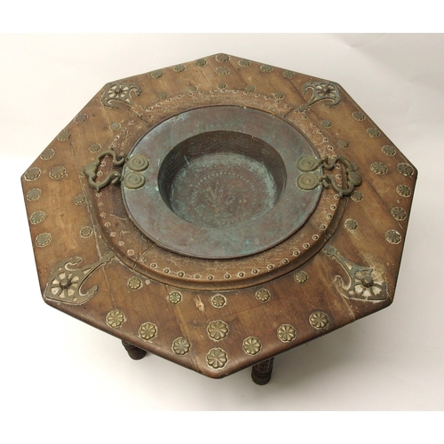 332 - A Persian copper octagonal hardwood wash basin