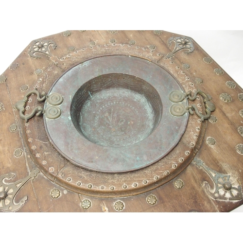 332 - A Persian copper octagonal hardwood wash basin