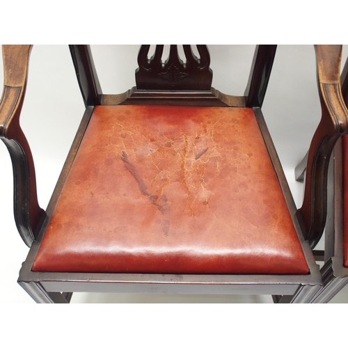 335 - A set of eight mahogany dining chairs including two carvers