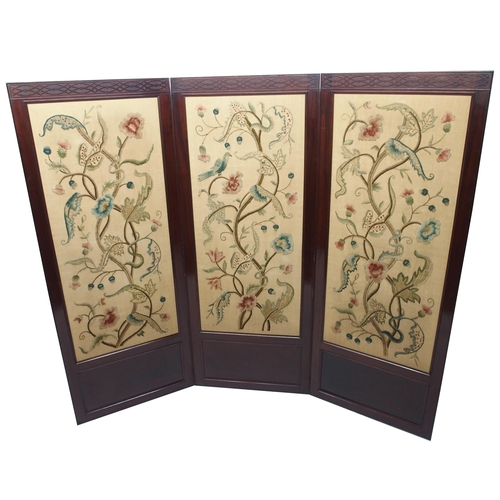 338 - A mahogany three fold draft screen