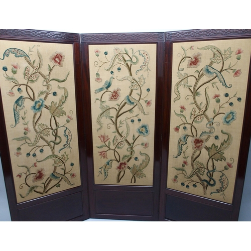 338 - A mahogany three fold draft screen