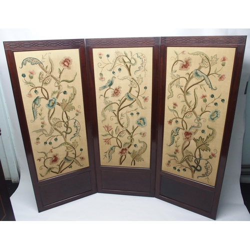 338 - A mahogany three fold draft screen