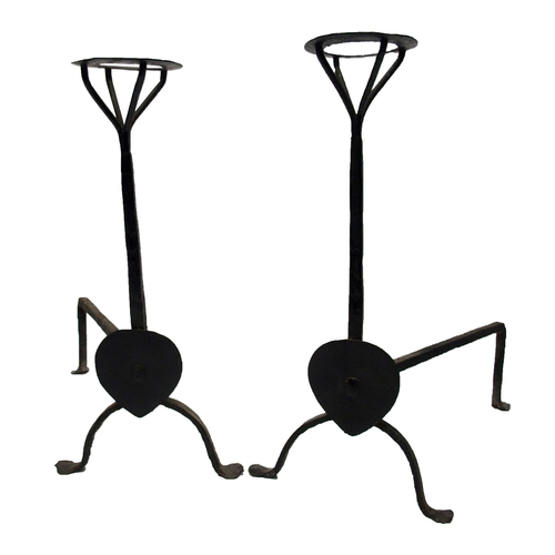 339 - A pair of Arts and Crafts wrought iron fire dogs