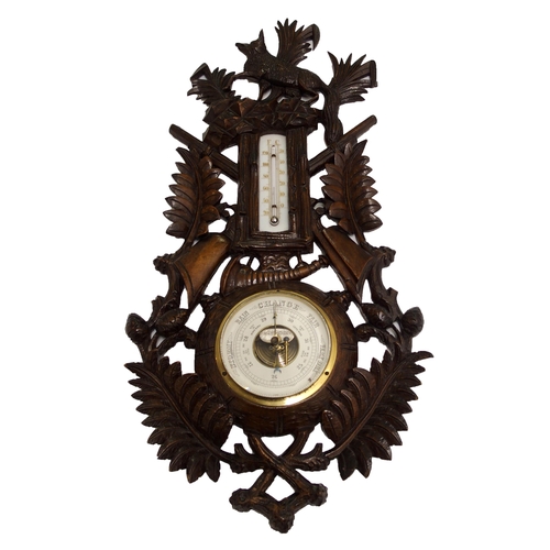 346 - A black forest stained barometer and thermometer