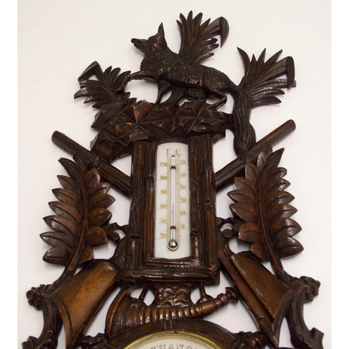 346 - A black forest stained barometer and thermometer