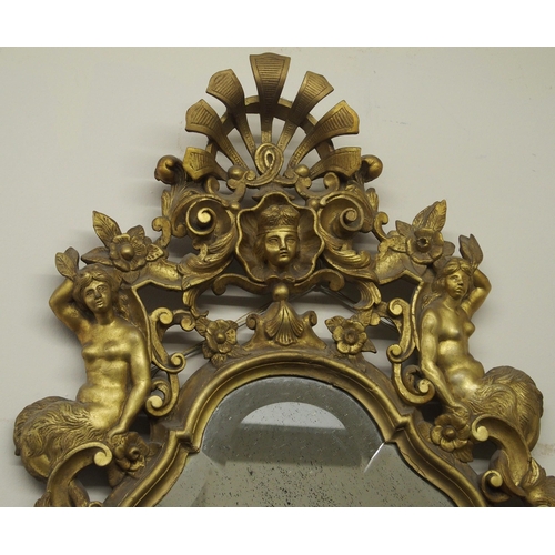 357 - A continental gilt wood wall mirror