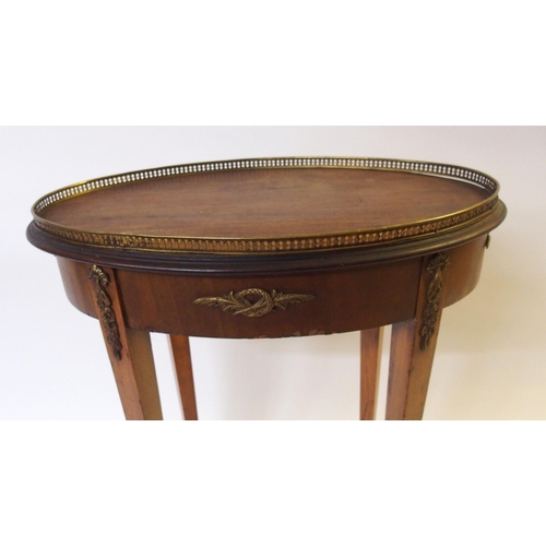 364 - A French mahogany and brass mounted oval occasional table