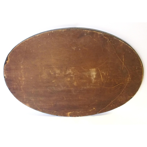 371 - An Arts and Crafts oxidised copper oval wall mirror