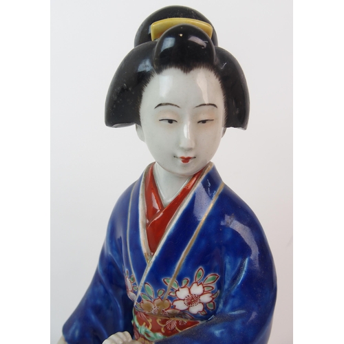 4 - An Arita figure of a lady