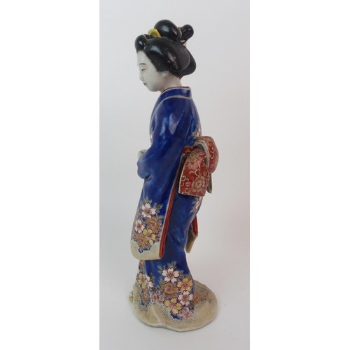 4 - An Arita figure of a lady