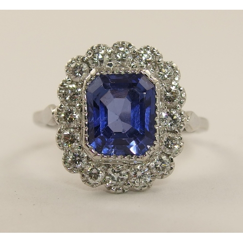 462 - An 18ct white gold blue gem stone and diamond ring