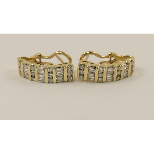 465 - A pair of diamond creole earring