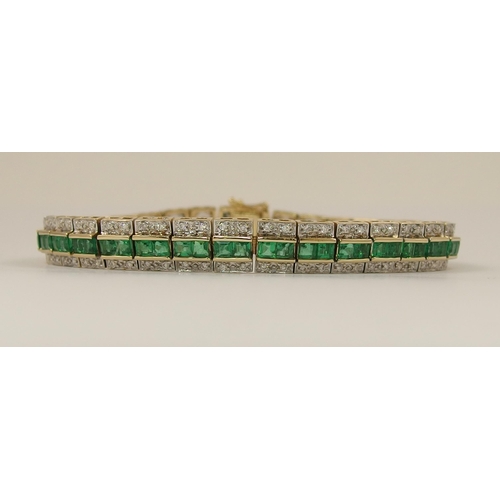 467 - A 14ct emerald and diamond line bracelet