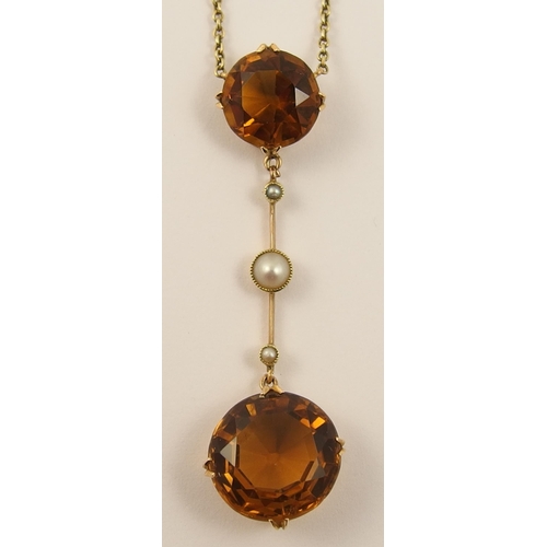 476 - An Edwardian cognac citrine and pearl pendant necklet