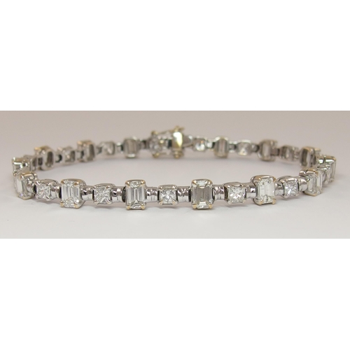 483 - A superb 6ct diamond line bracelet