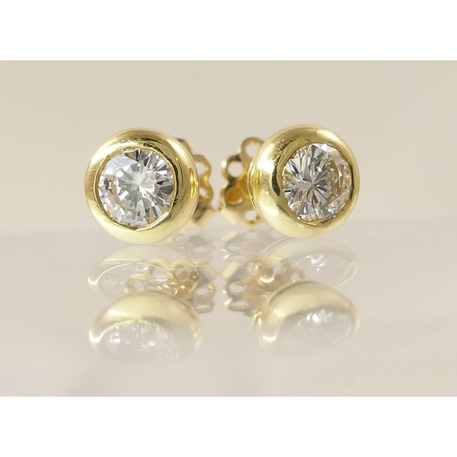 484 - A pair of substantial diamond stud earrings