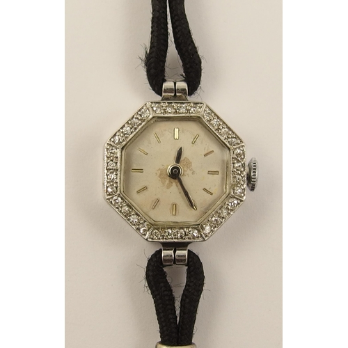 635 - A platinum and diamond cocktail watch