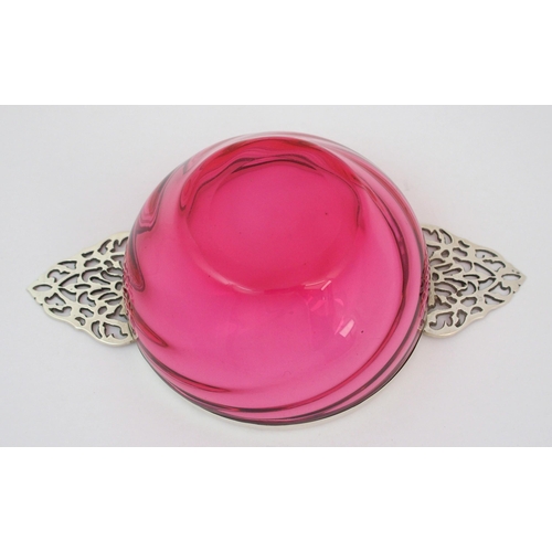 653 - A silver mounted cranberry glass quaich