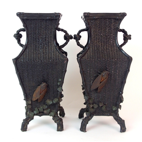 67 - A pair of Japanese bronze square shaped vases