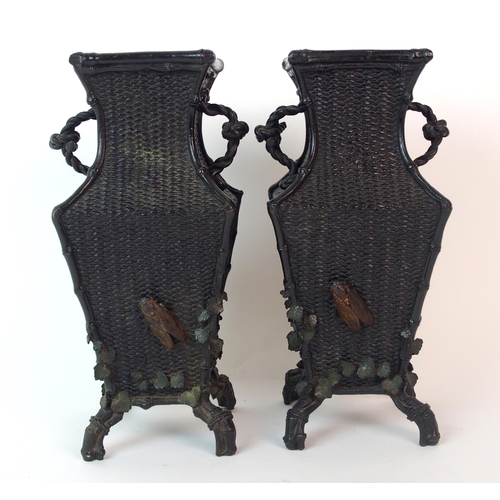 67 - A pair of Japanese bronze square shaped vases