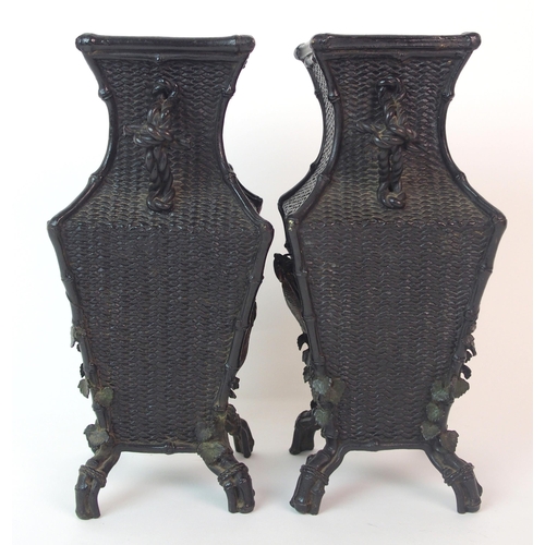 67 - A pair of Japanese bronze square shaped vases