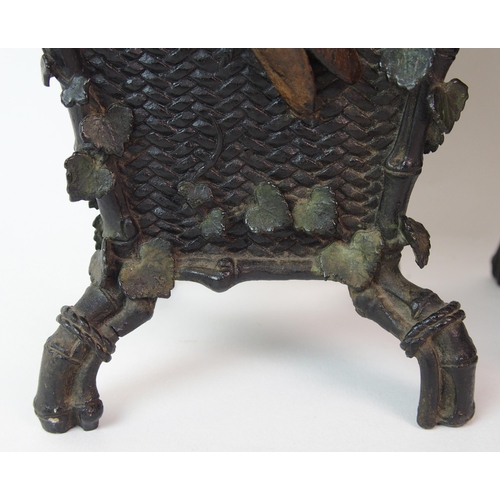 67 - A pair of Japanese bronze square shaped vases