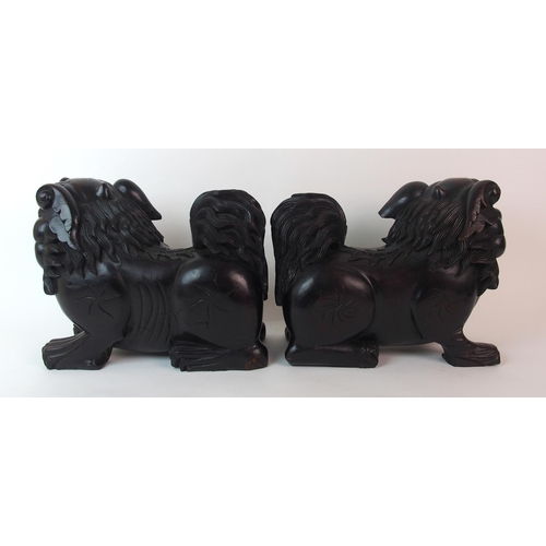 68 - A pair of Chinese ebonised dogs of Fo