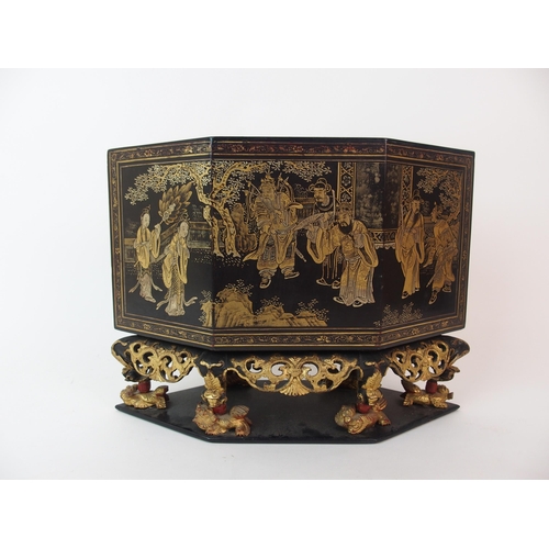 69 - A Vietnamese black and gold lacquered cake box