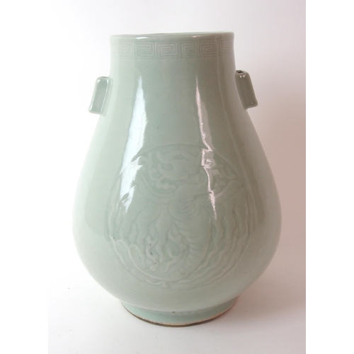 81 - A Chinese celadon archers vase